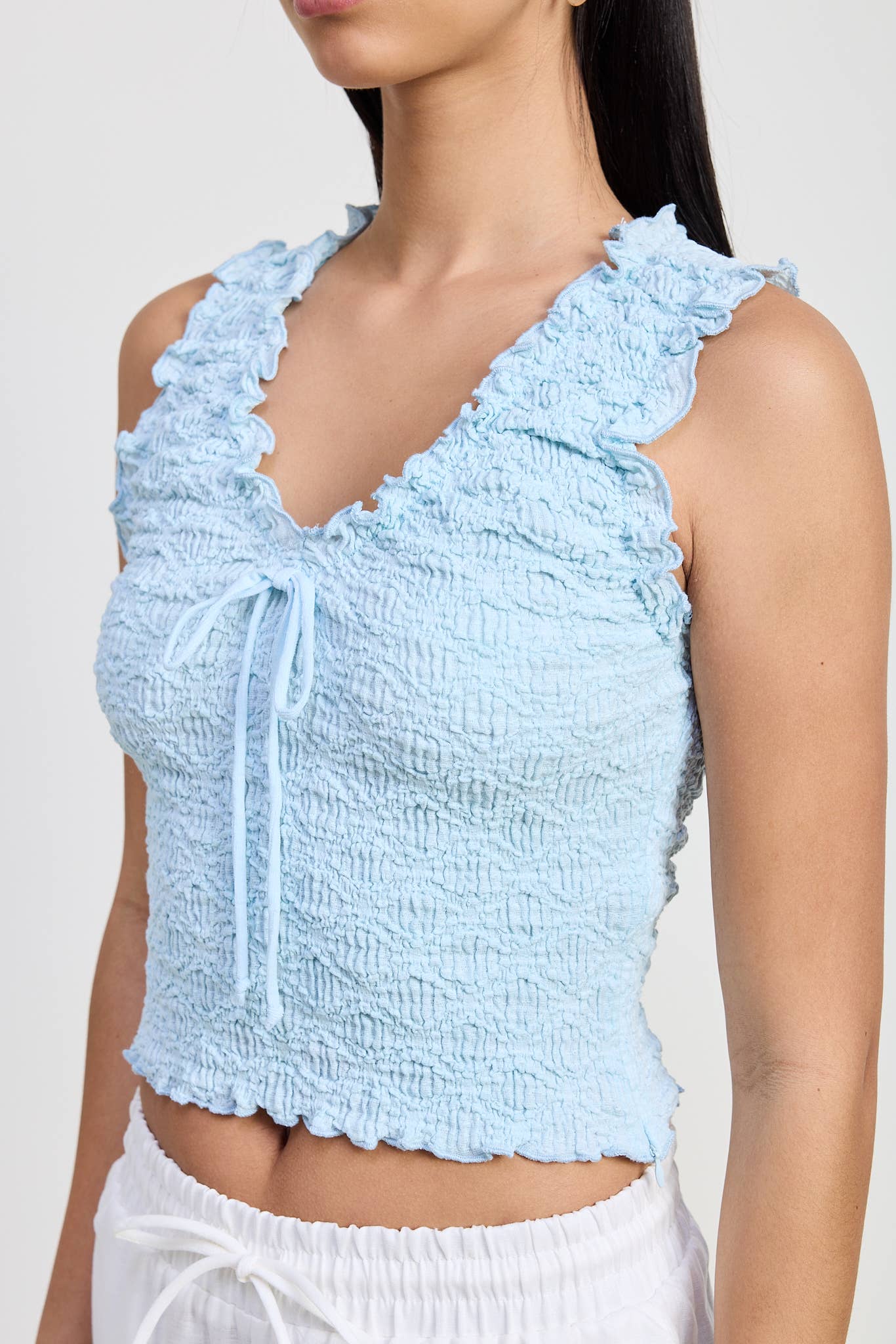 SLEEVELESS RUFFLE TOP: BLACK / IPK2054T